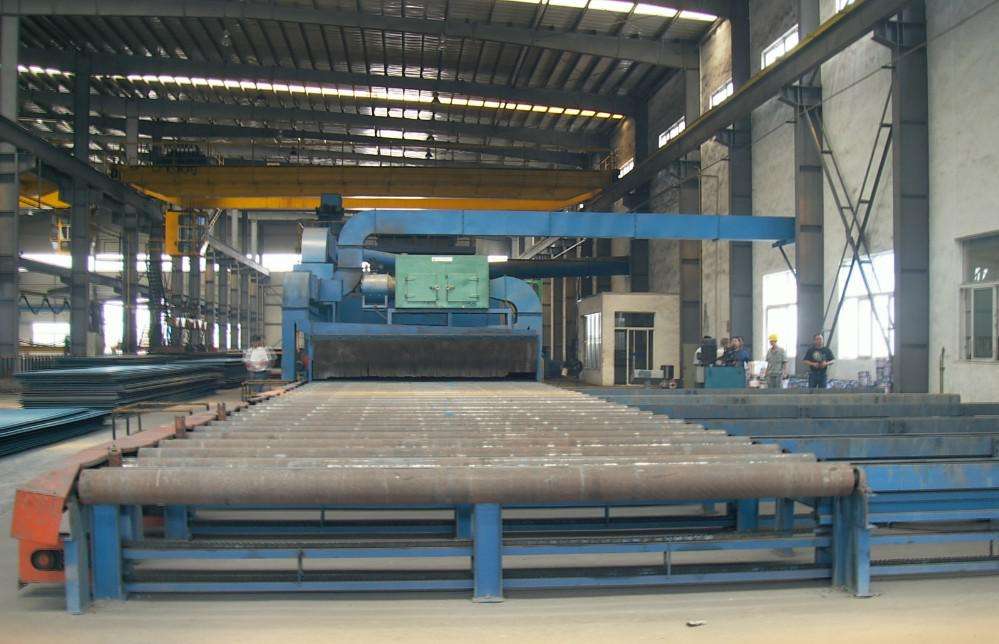 通過(guò)式拋丸機(jī)在車間內(nèi)調(diào)試